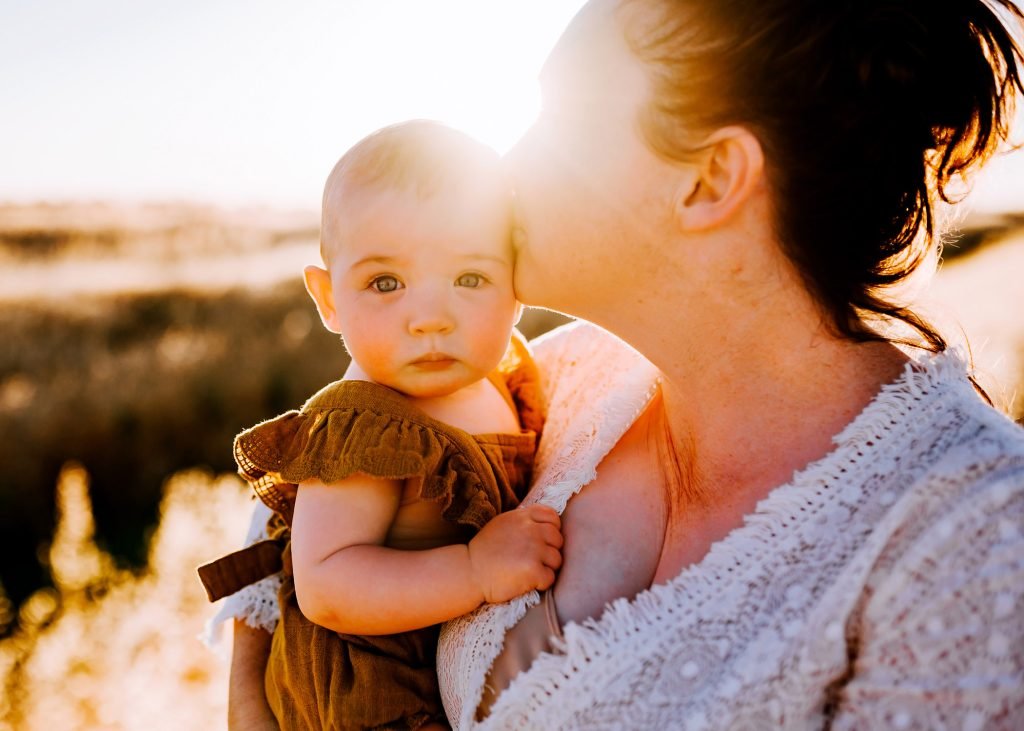 Outdoor family portrait by Kristielle Amy
