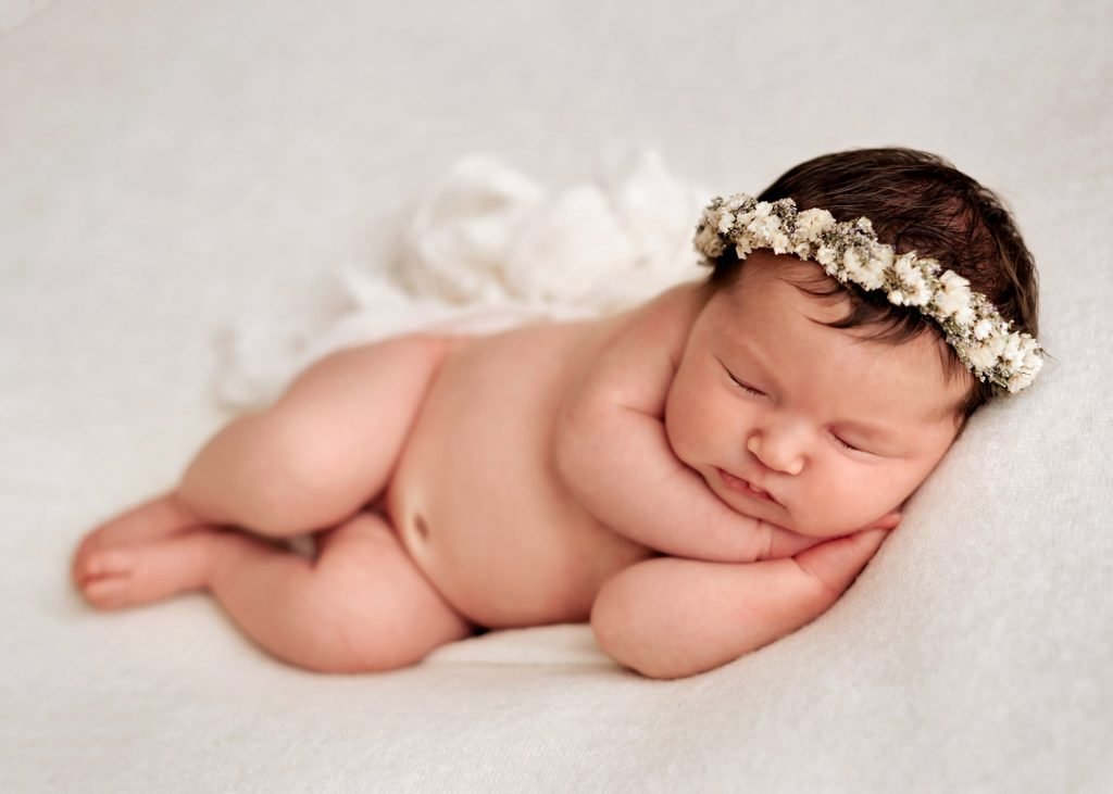 Sleeping newborn portrait by Kristielle Amy